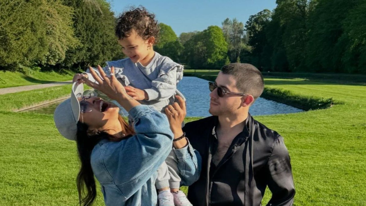 Priyanka Chopra’s daughter Malti closing her eyes while she kisses hubby Nick Jonas has to be the cutest snap of this trio; PICS