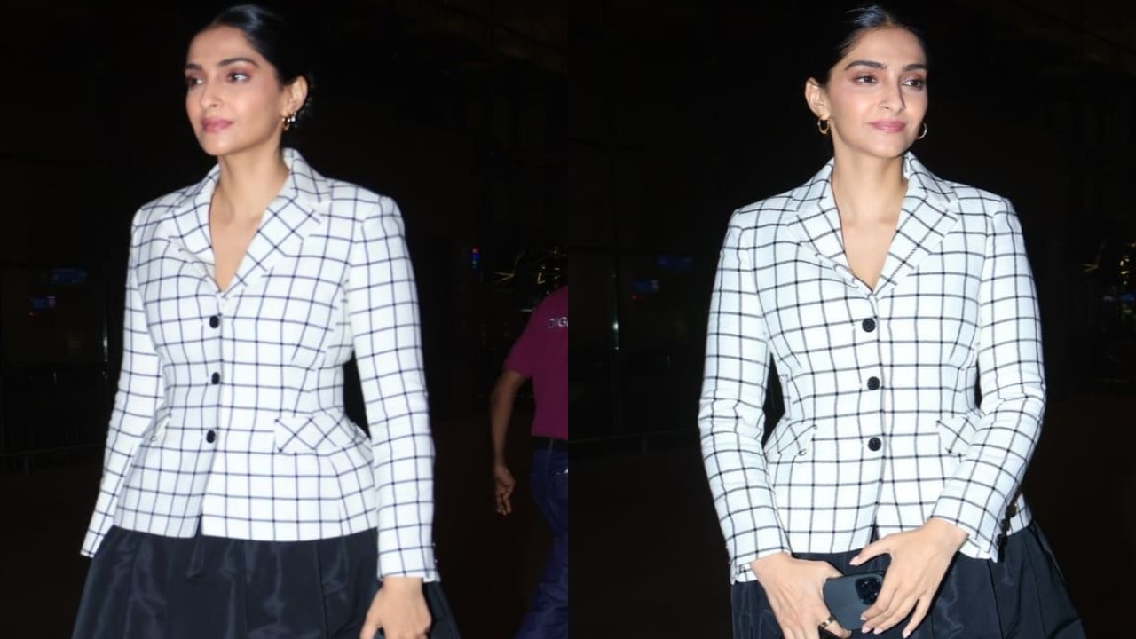 Sonam Kapoor at airport in Checkered blazer and black skirt