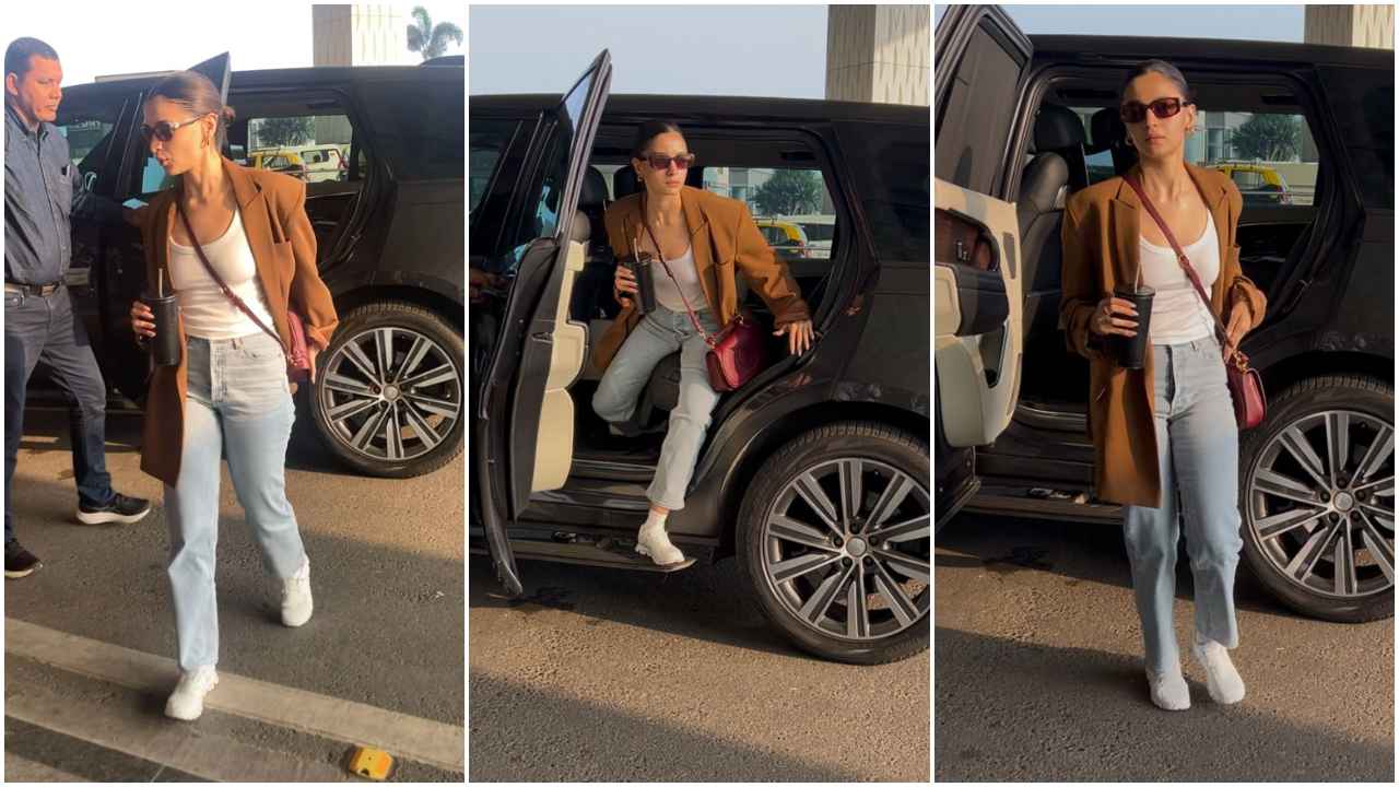 Alia Bhatt keeps her airport look trendy in oversized tan blazer with blue denim jeans and Rs 3,27,439 Gucci bag (PC: Varinder Chawla)