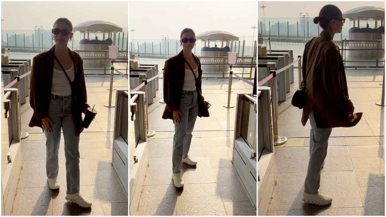 Alia Bhatt keeps her airport look trendy in oversized tan blazer with blue denim jeans and Rs 3,27,439 Gucci bag (PC: Varinder Chawla)