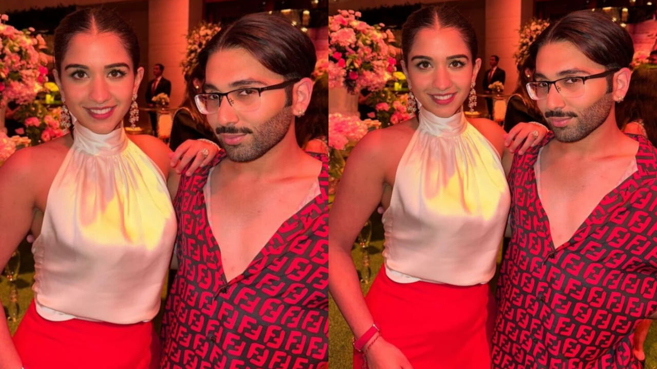 Radhika Merchant in white top and red skirt 