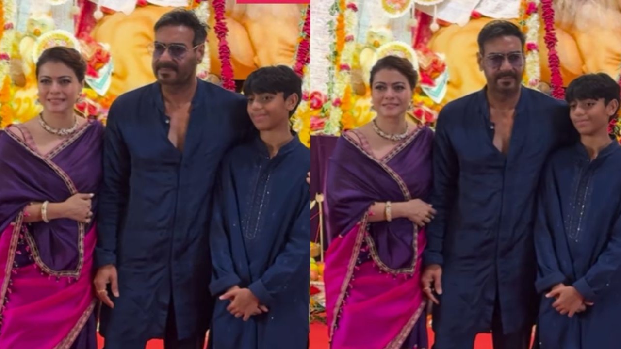 WATCH: Kajol pinching Ajay Devgn to pose for perfect family picture at Durga Puja pandal is every poser wife ever; Son Yug’s reaction is UNMISSABLE