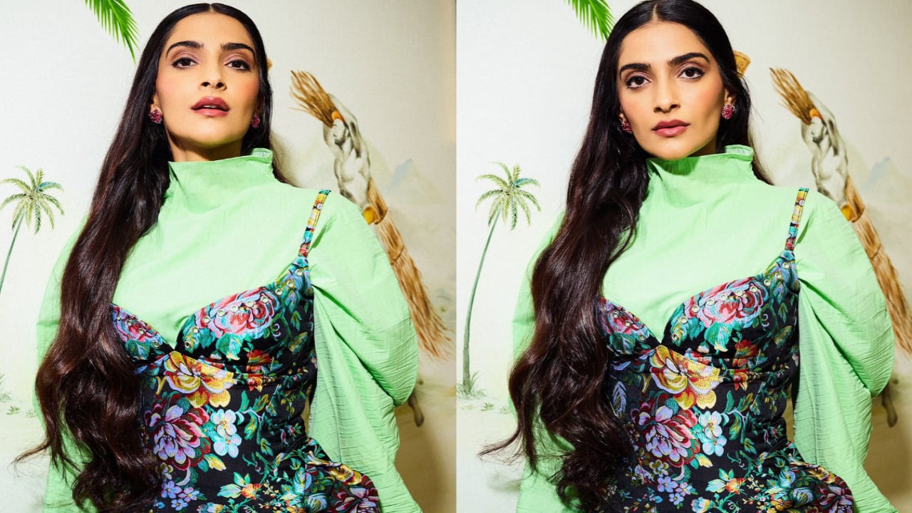 Sonam Kapoor served another statement look in a green pleated dress with a floral corset