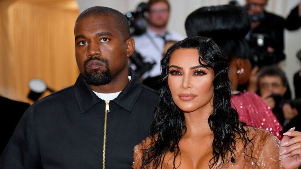 Kanye West and Kim Kardashian (via Getty Images)