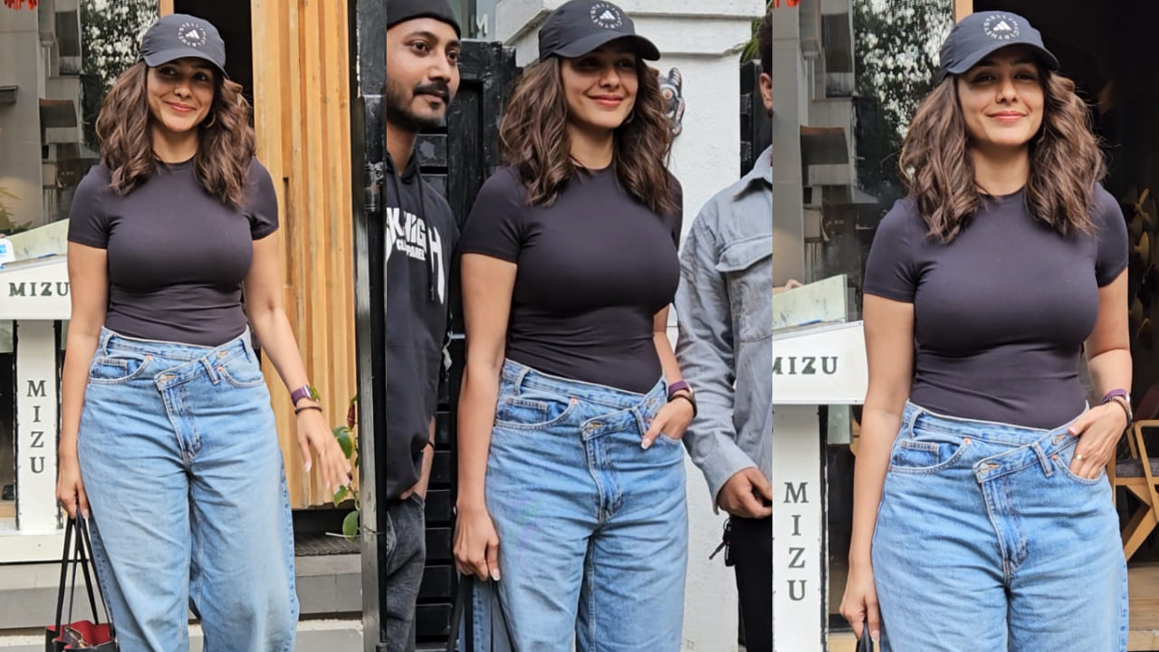 Mrunal Thakur was spotted exiting a restaurant and her sporty look ft. crossover denim pants is cool and stylish