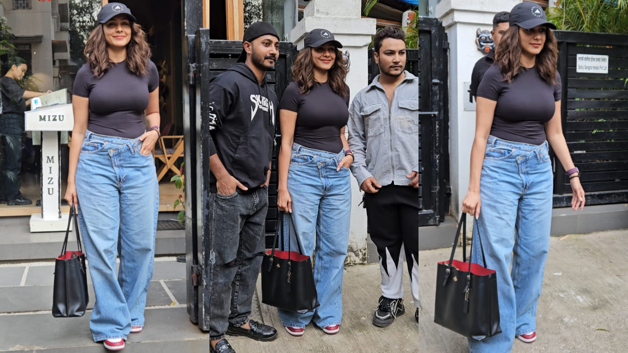 Mrunal Thakur was spotted exiting a restaurant and her sporty look ft. crossover denim pants is cool and stylish