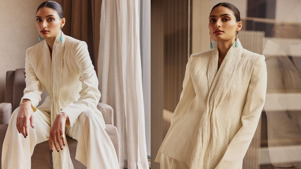 Mom-to-be Athiya Shetty proves her boss-lady persona is unstoppable in Rimzim Dadu’s tailored white pantsuit with striking details