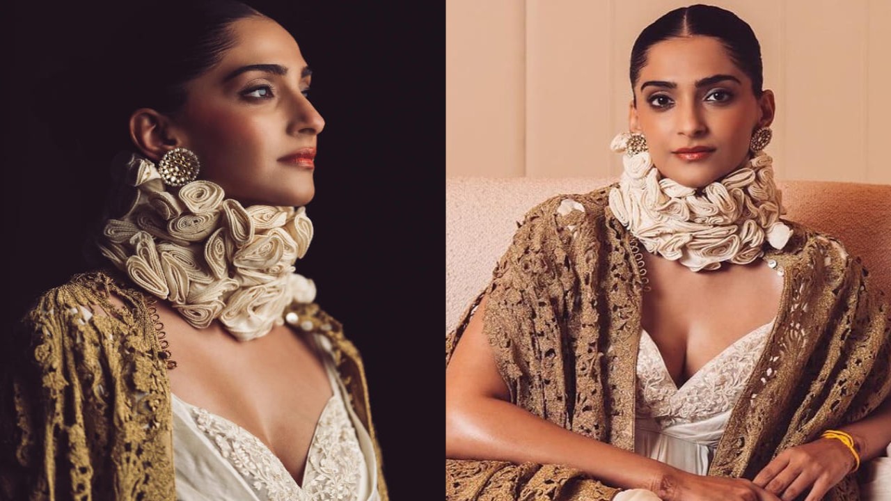 Sonam Kapoor in white gown and brown shrug 