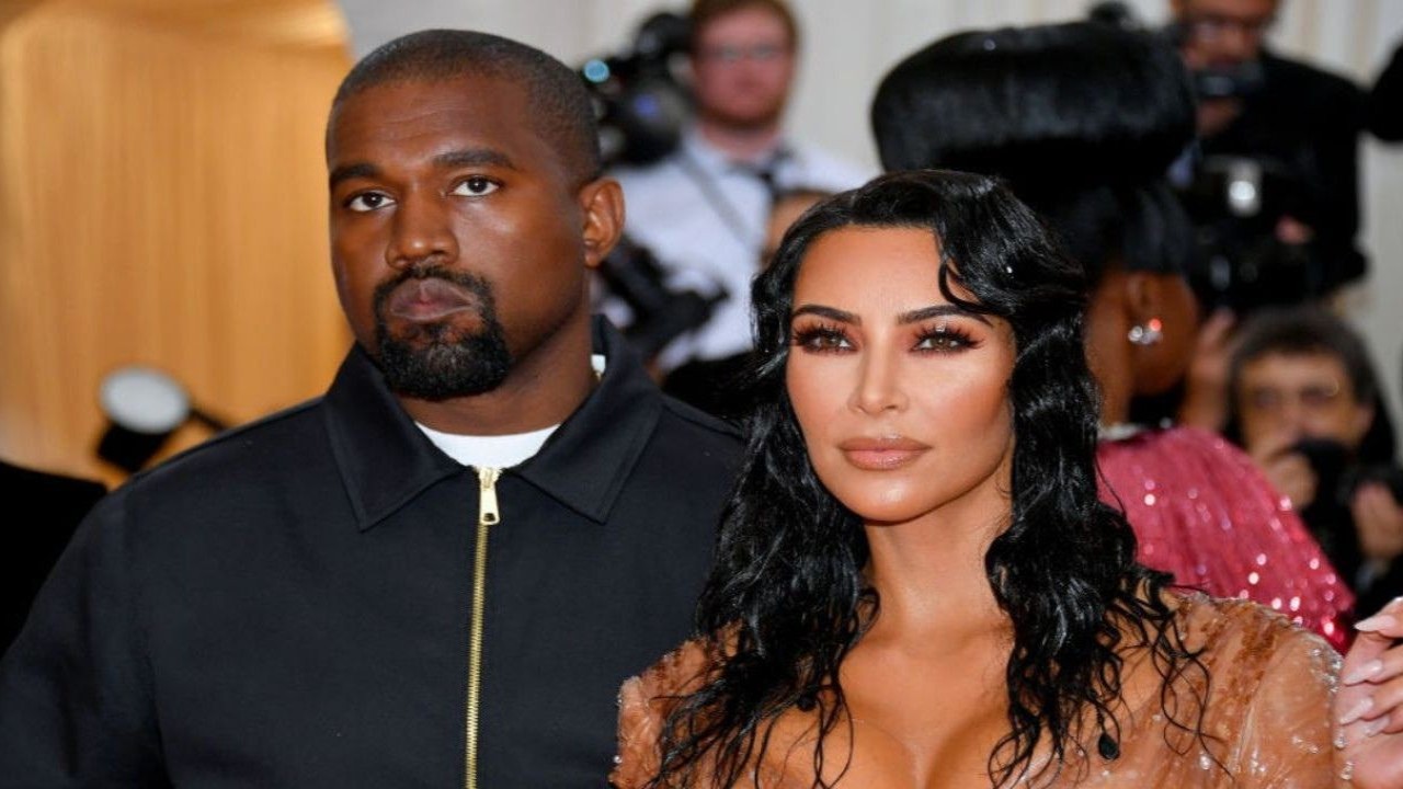 Kanye West and Kim Kardashian (CC: Getty Images)