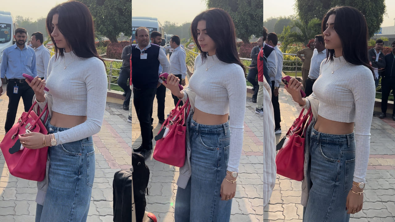 Khushi Kapoor was spotted at Jamnagar airport looking cozy and chic in a grey turtleneck top and denim jeans. 