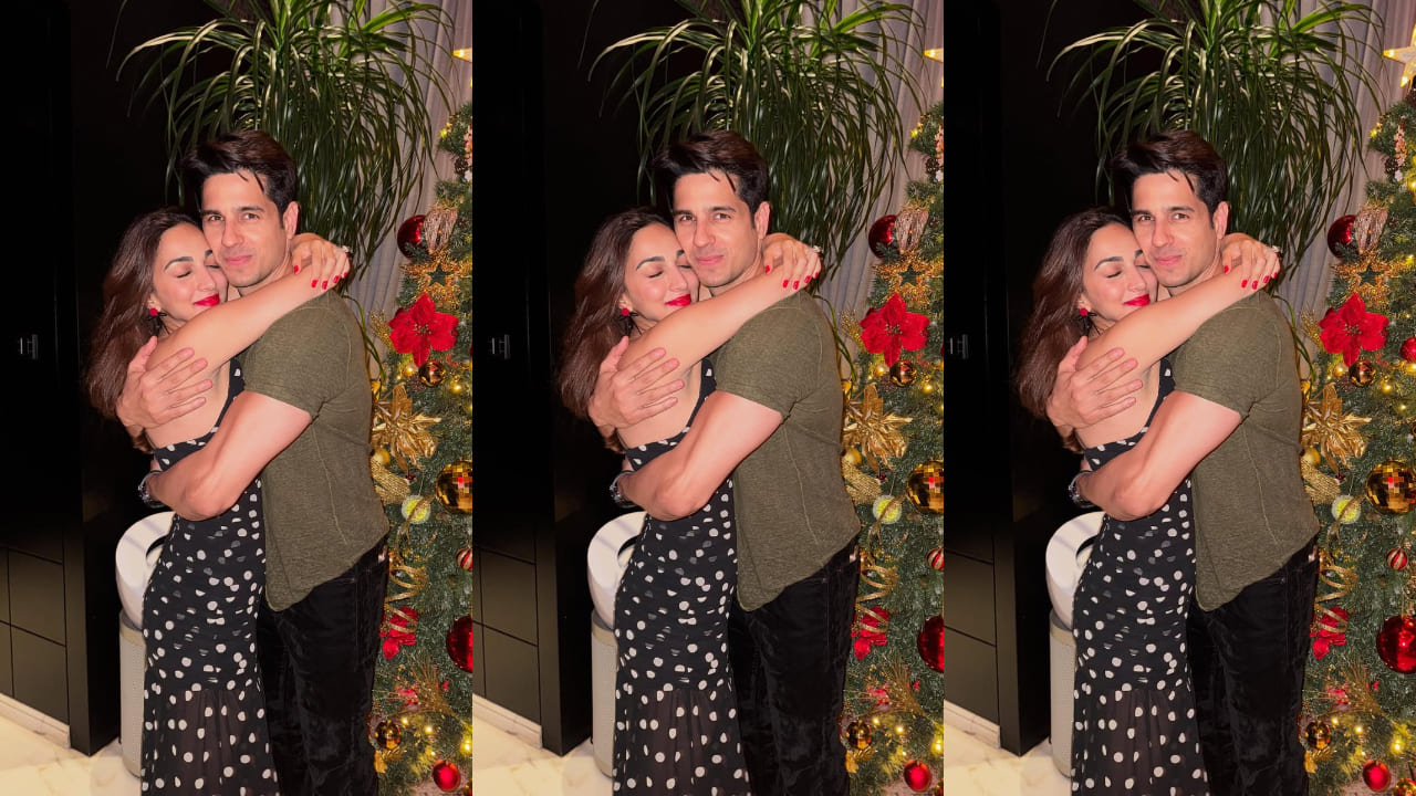 Kiara Advani adds a festive red pop to her sheer black polka dot Christmas dress as she shares a warm hug with Sidharth Malhotra