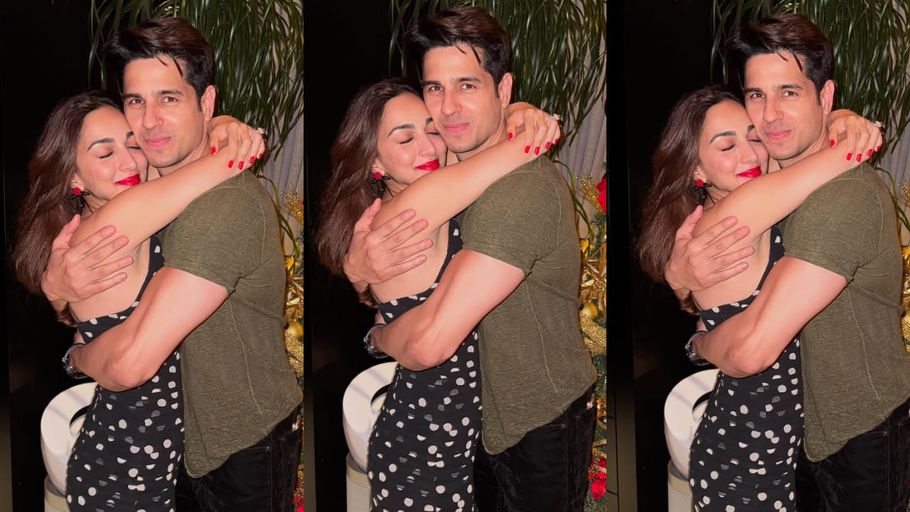 Kiara Advani adds a festive red pop to her sheer black polka dot Christmas dress as she shares a warm hug with Sidharth Malhotra