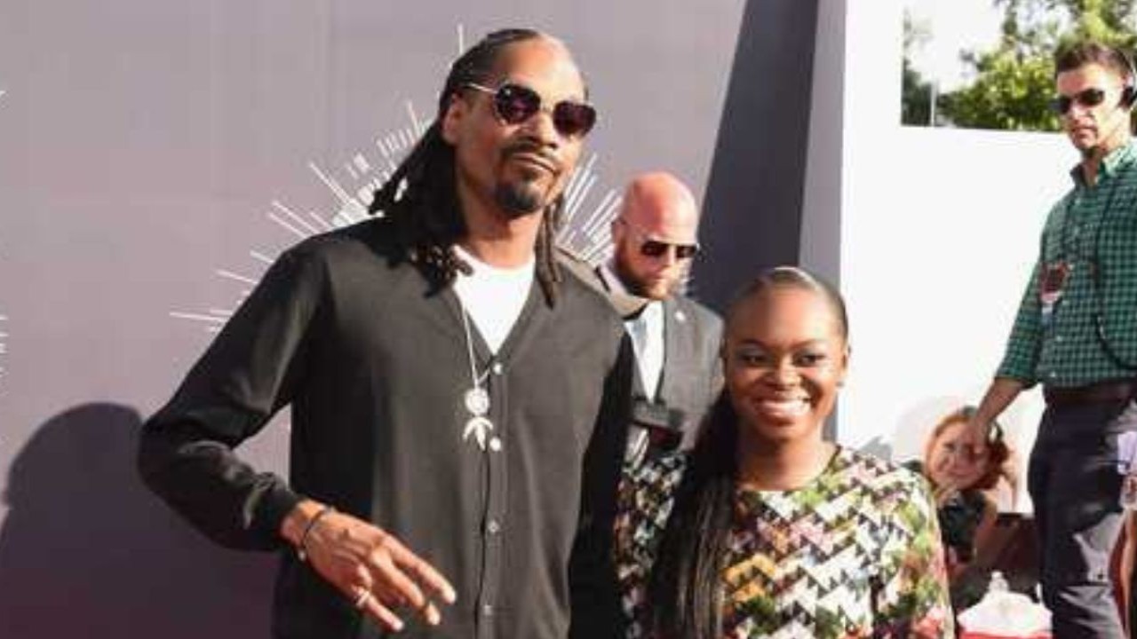 Snoop Dogg and Cori Broadus (CC: Getty images)