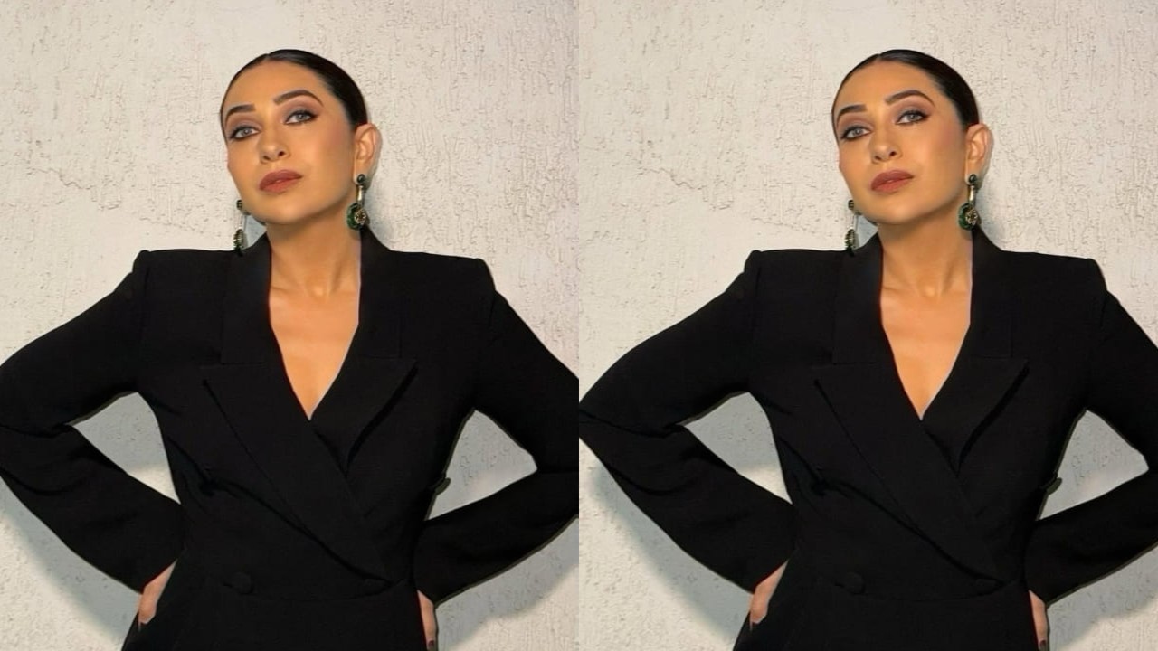 Karisma Kapoor dishes out boss-babe vibes in bold blazer jumpsuit and classic hair bun