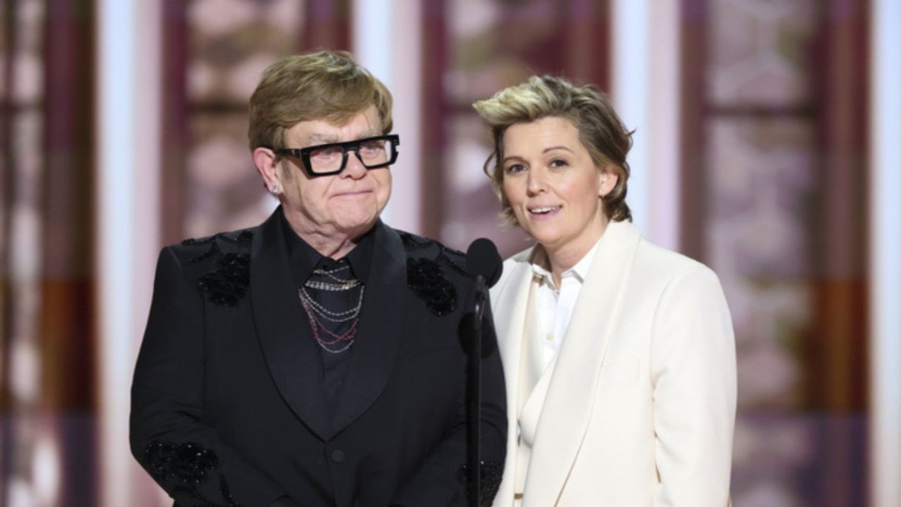 Elton John and Brandi Carlile (CC: Getty images)