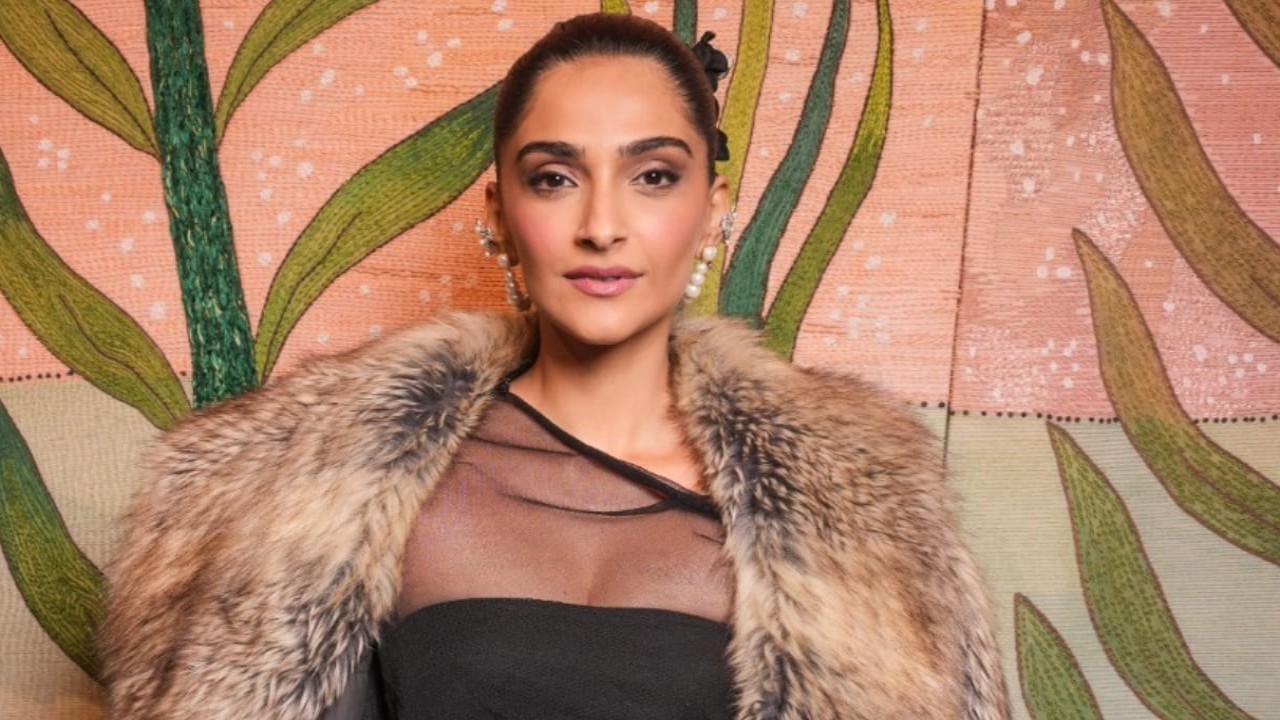 Sonam shows she is class apart in style at PFW, donning sheer dress and faux fur coat