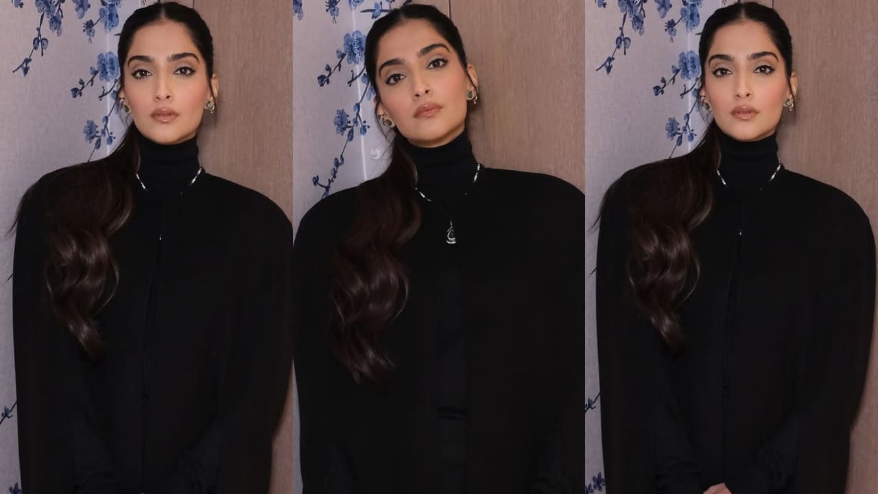 Sonam Kapoor gracefully channels CEO vibes in the sweater and skirt combo styled with cape coat, proving neutral colors are always attractive