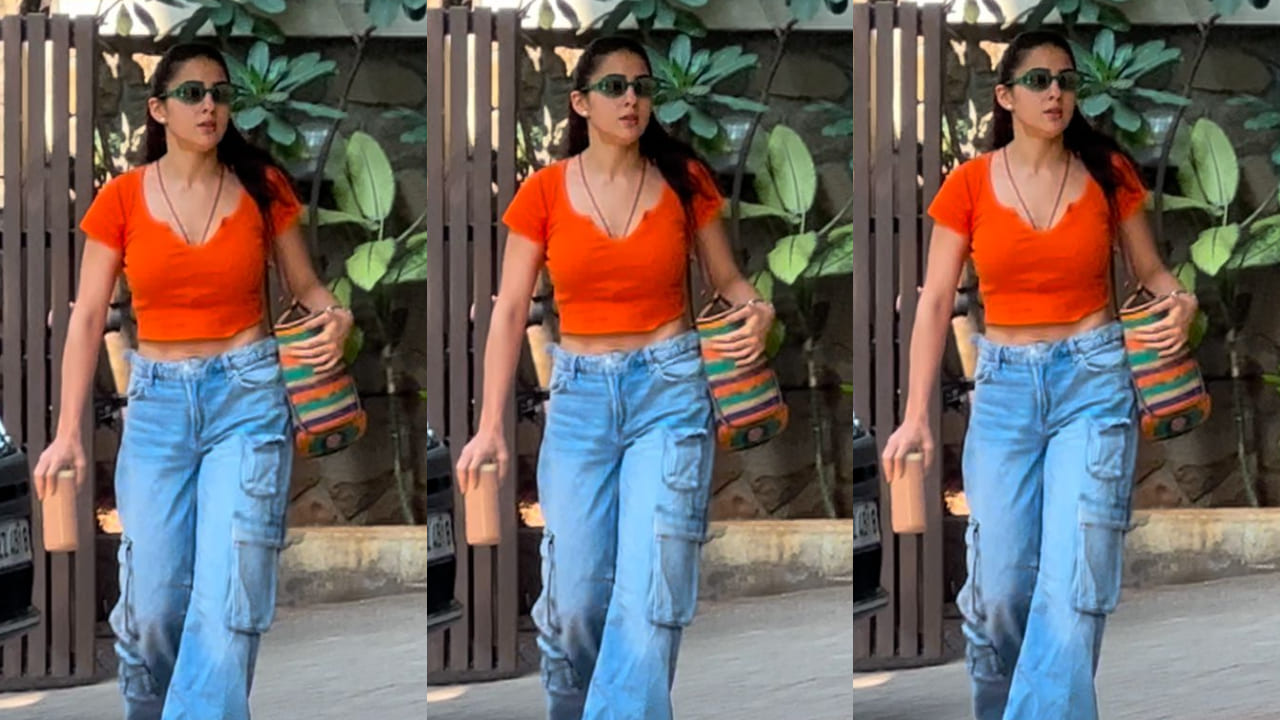  Sara Ali Khan mixes playful colors with practical style, pairing an orange crop top with trendy cargo jeans for a fresh look