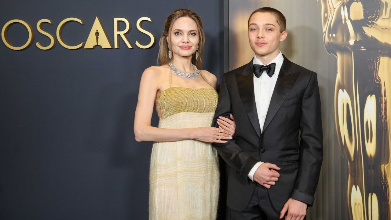 Angelina Jolie and son Knox help those in need