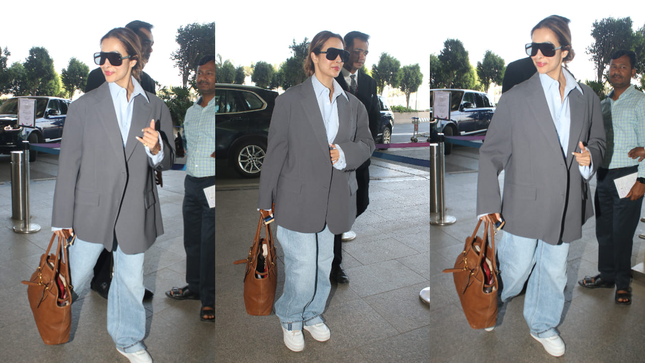 Malaika Arora slays her airport look in crop shirt and blazer, finishes off with stylish Miu Miu bag worth Rs 3,57,900