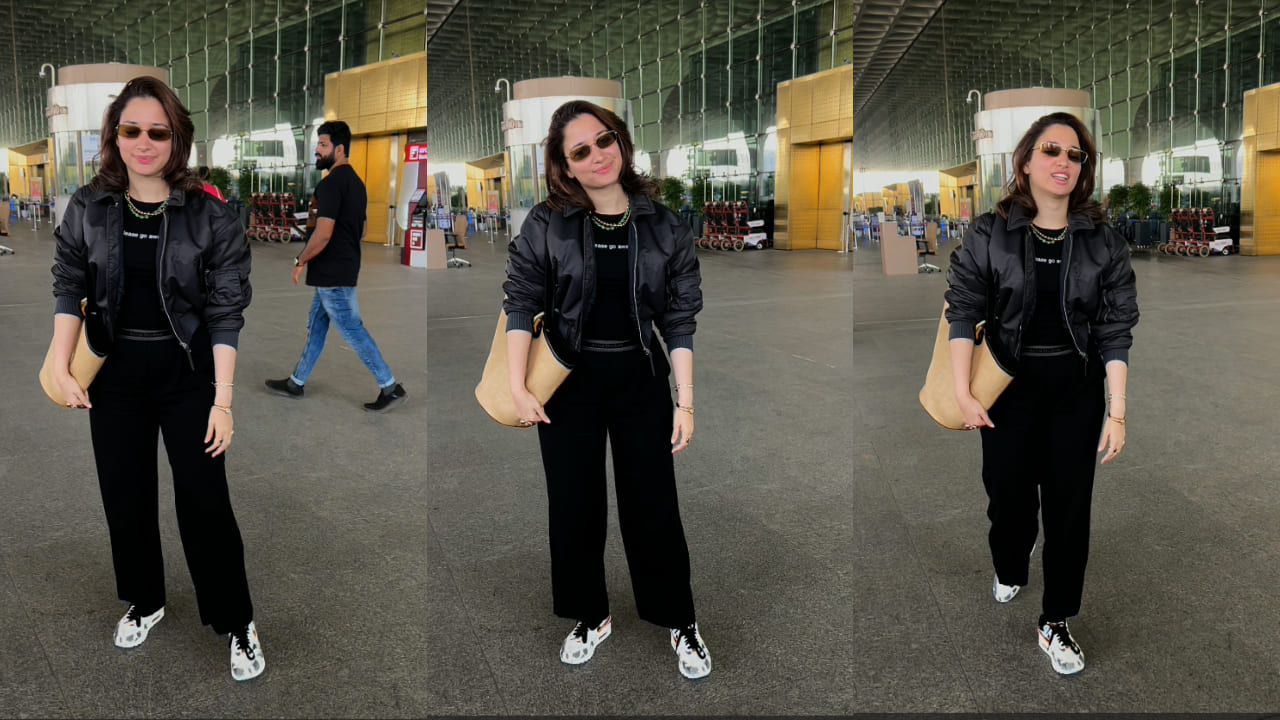 Tamannaah Bhatia chooses a black crop jacket and ₹42K trousers for airport look that’s equal parts trendy and practical