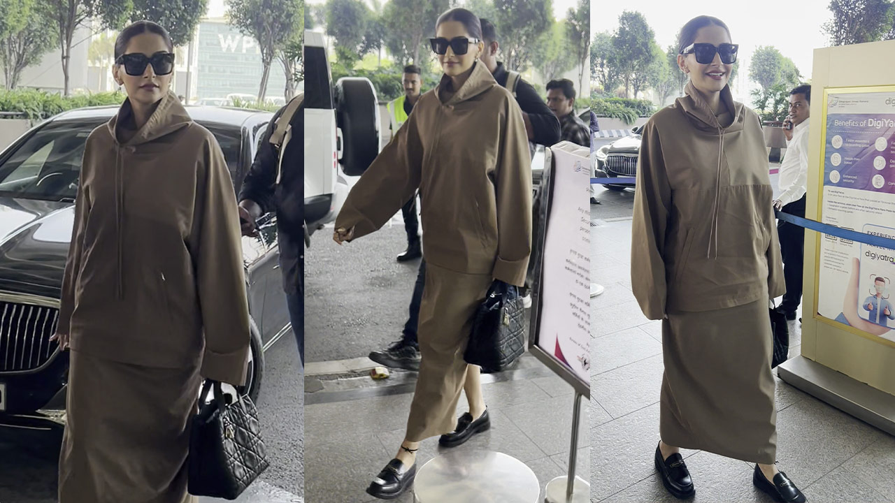 Sonam Kapoor’s Rs 89,000 loafers add a bold touch to her monochromatic hoodie and skirt ensemble. PS: Varinder