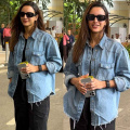 Triptii Dimri blends cool with casual to serve an edgy oversized denim jacket airport look with black cargo pants