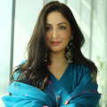 Yami Gautam looks oh-so mesmerizing in her traditional blue organza kurta set paired with statement earrings