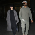 Katrina Kaif shows us how to master the art of layering casuals at the airport in a grey trench coat worth Rs 29,460