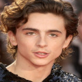 Timothée Chalamet Rocks Chic Mini Purse; Fans Speculate Girlfriend Kylie Jenner Has Something To Do With It