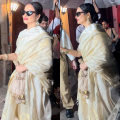 Rekha effortlessly adds cool twist to her ethnic look, rocking a white silk saree paired with cat-eye sunglasses 