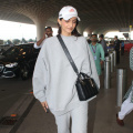 Sonam Kapoor swaps her signature glam for a sporty vibe at airport in grey tracksuit and personalized cap