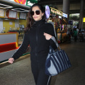 Sonam Kapoor keeps it sporty for airport look in tracksuit and sneakers; flaunts her Dior bag for that luxe-touch