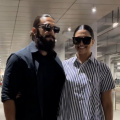 Ranveer Singh doesn’t let go of wifey Deepika Padukone’s hand; couple flashes million-dollar smiles as they arrive at airport; WATCH