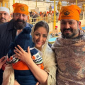 Yami Gautam and Aditya Dhar seek blessings at Golden Temple along with their son Vedavid; Sanjay Dutt joins