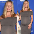 Mom-to-be Margot Robbie debuts baby bump on red carpet in classy gray bodycon dress that SLAYS