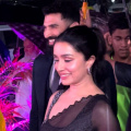 Shraddha Kapoor and Aditya Roy Kapur's reunion while it rains in Mumbai reminds fans of the iconic scene from Aashiqui 2; WATCH