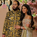 Anant Ambani and Radhika Merchant are shining in shimmering silver and gold AJSK ensembles wrapped in love