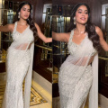 Is it a fairy or Janhvi Kapoor in a white sheer saree adorned with pearls, casting spells of enchantment on us?