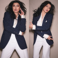 Sushmita Sen makes powerful style statement in white satin shirt and wide-leg pants paired with pinstripe blazer