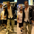 Shah Rukh Khan’s off-duty airport look with white shirt, hoodie and baggy jeans is all about comfort and style