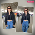 Airport style: Rasha Thadani's black jacket with blue cargo and Delvaux bag look is the ultimate cool-girl fashion inspo