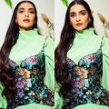  Sonam Kapoor's Thanksgiving look in green pleated dress and floral corset is a fusion of colors,  an outfit only she could have pulled off