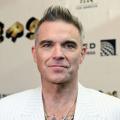 Robbie Williams Reveals Why He’s Depicted As A 'Cheeky Monkey’ In Biopic Better Man