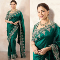 Dhak Dhak Girl Madhuri Dixit styles emerald saree with sage green dupatta for a royal look 