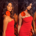 Suhana Khan sparkles with fiery flair in a fashionably fabulous red mini-dress with trendy leather twists