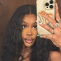 SZA Reveals Being A Gymnast Before Transitioning Into Music; Engages in Friendly Handstand Competition With Simone Biles