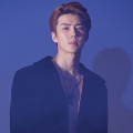 EXO's Sehun accused of smoking indoors in old video clip; fans claim source too blurry to confirm