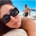 Kareena Kapoor enjoys sunny day on UK beach in teal swimsuit but it's shirtless 'photobomber' Saif Ali Khan who has our attention