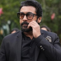 Suriya exudes charisma in a sleek all-black tuxedo, captivating fans with his stylish look; see PICS